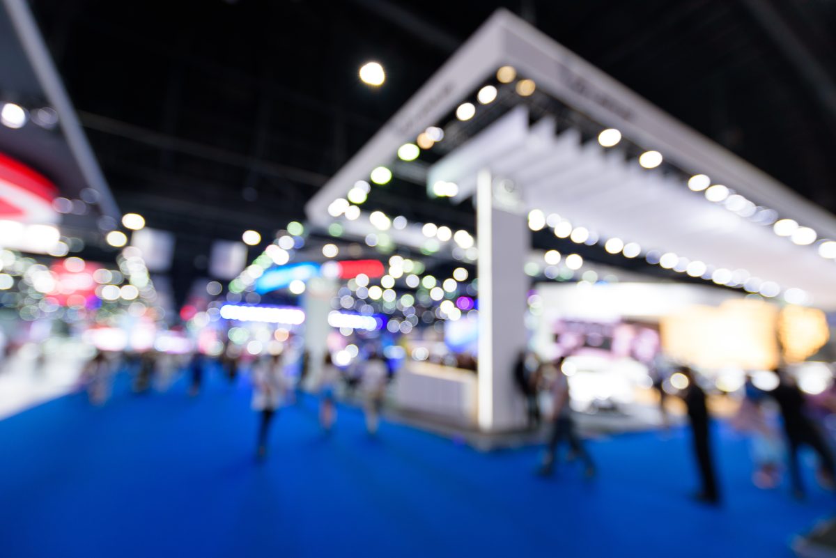 Blurred background of event exhibition show public hall, busines